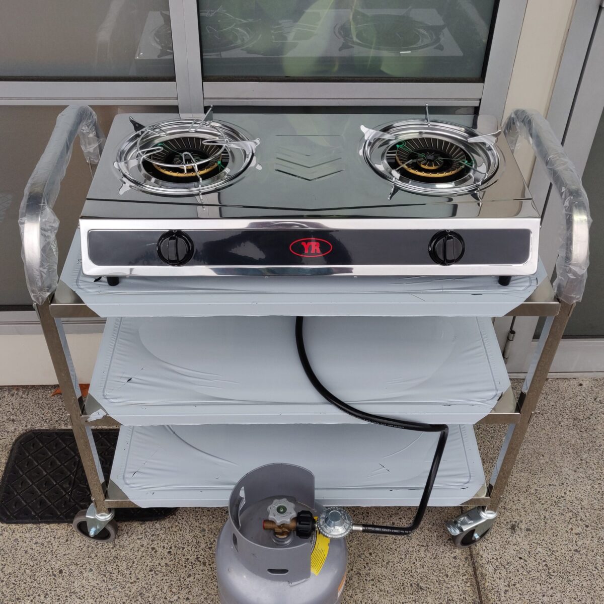 Double burner gas stove with kitchen trolley